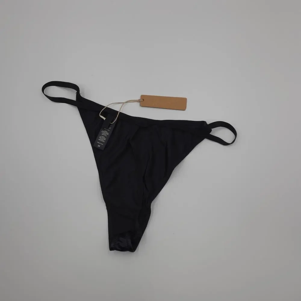 Skims Bundle of Two Seamless Ribbed and T-String Thong in Bone Onyx Size 2X